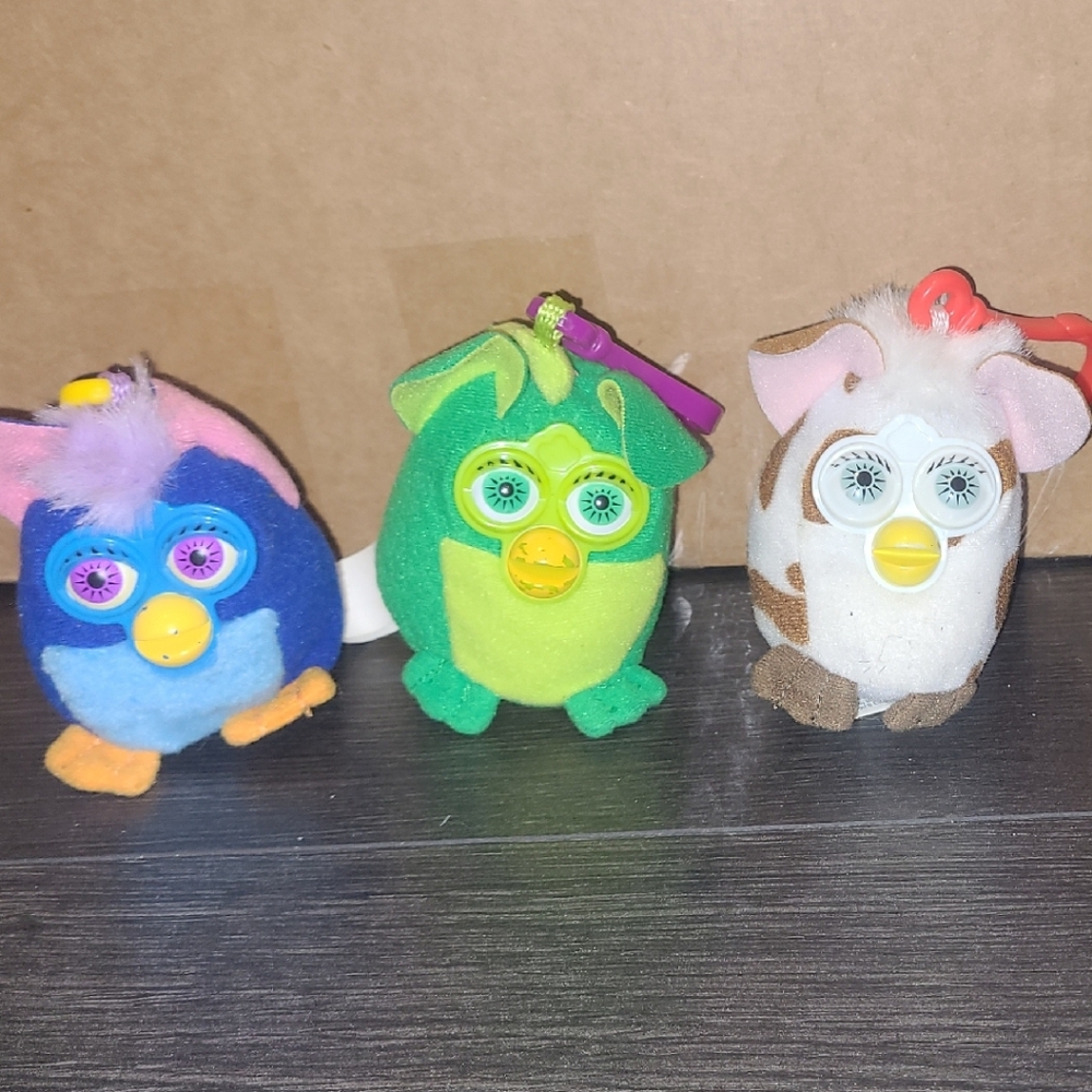 Set of Three Colorful Plush Toys